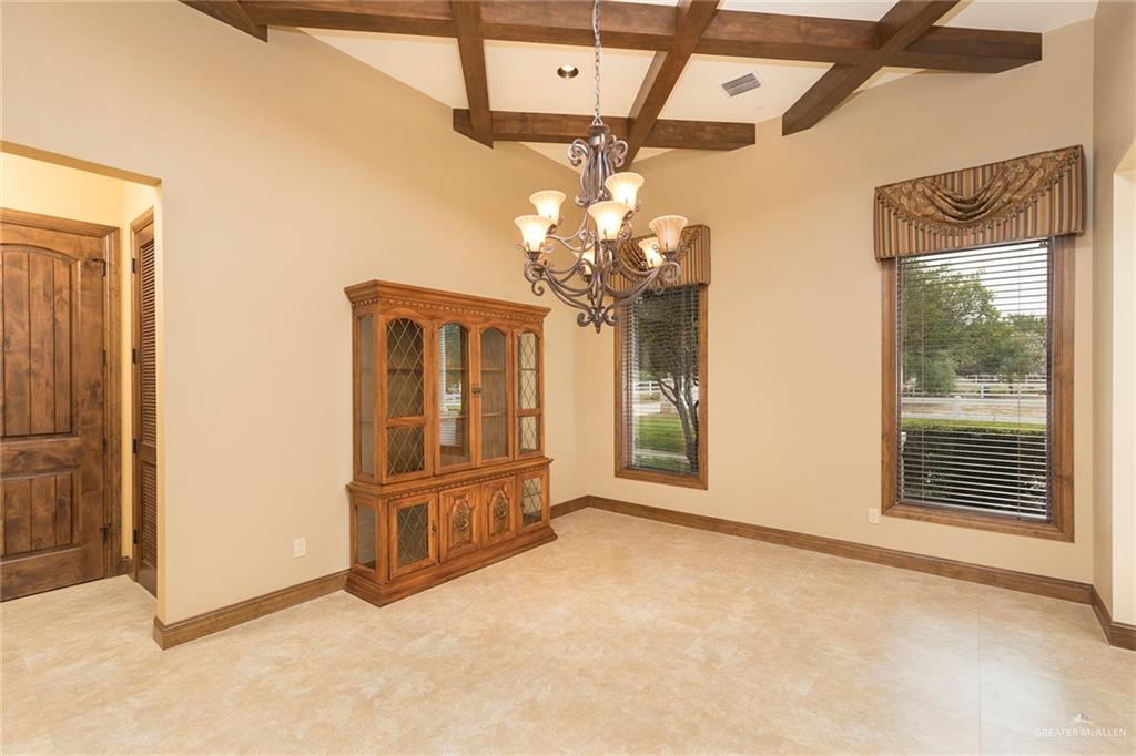 3007 Bryan Road Mission, TX 78574 - Photo 10 of 43 Formal dining room in front of the home. China cabinet not included.