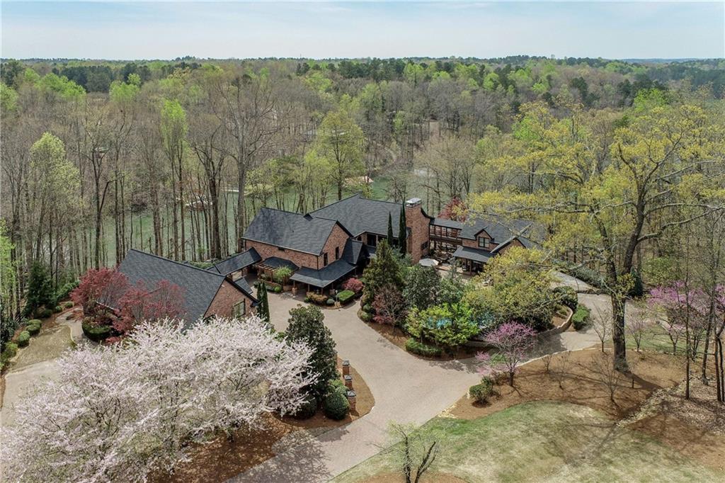 6003 Overby Road Flowery Branch, GA 30542 - Photo 1 of 1 Stunning 3-building complex near water's edge on Lake Lanier