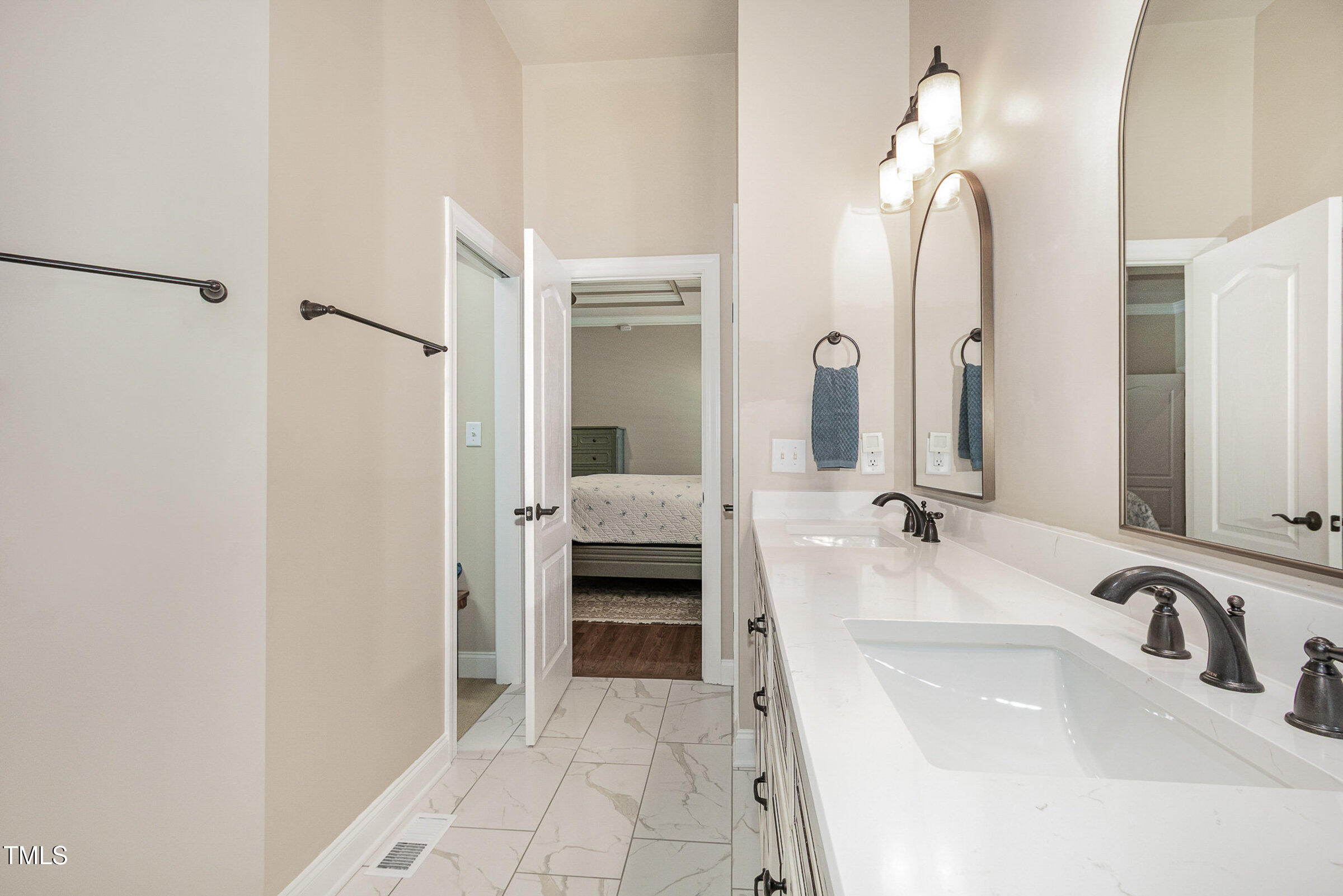 2027 Hopeton Avenue Raleigh, NC 27614 - Photo 18 of 33 Primary Bathroom - Looking towards bedroom