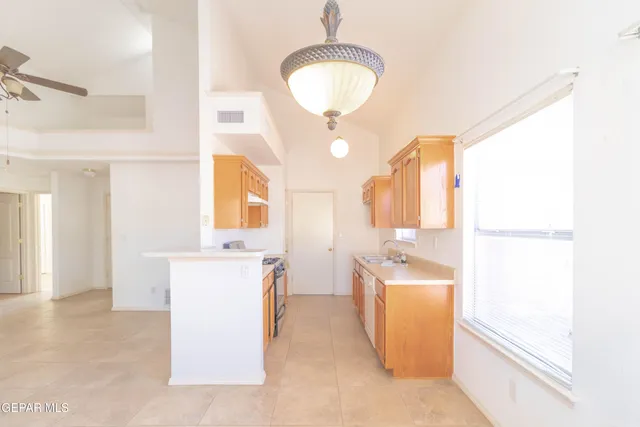 a bathroom with a sink a bathtub and a mirror