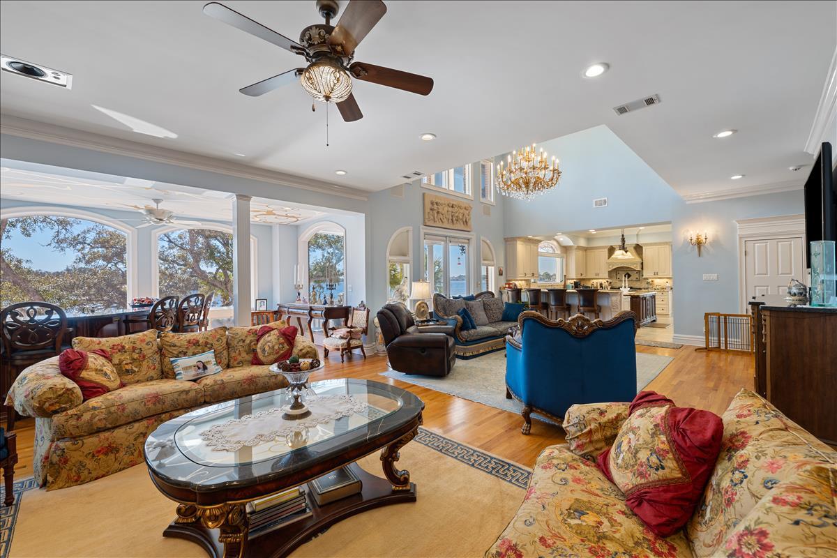 83 Poquito Road Shalimar, FL 32579 - Photo 17 of 83 a living room with furniture kitchen and a chandelier