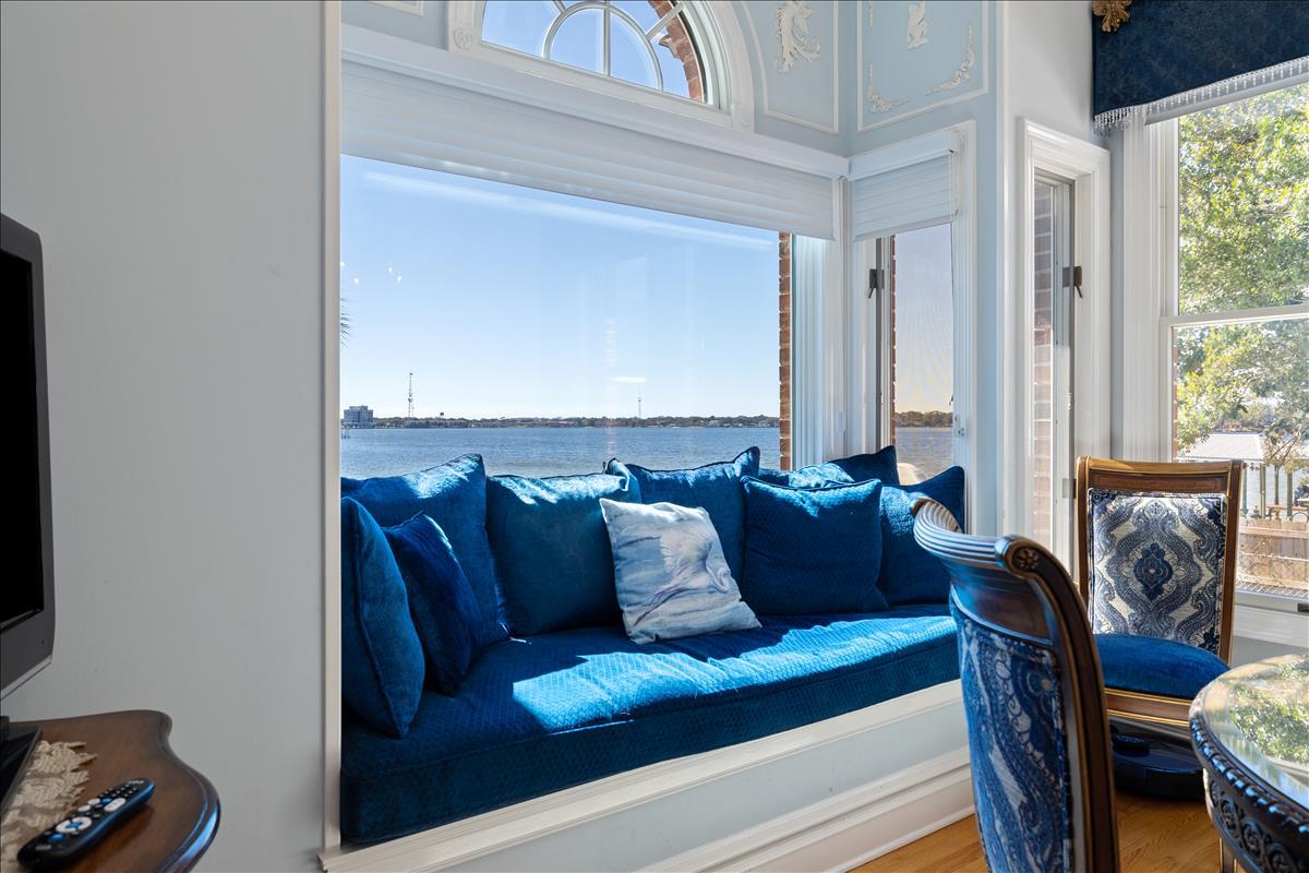 83 Poquito Road Shalimar, FL 32579 - Photo 28 of 83 a living room with furniture and a window