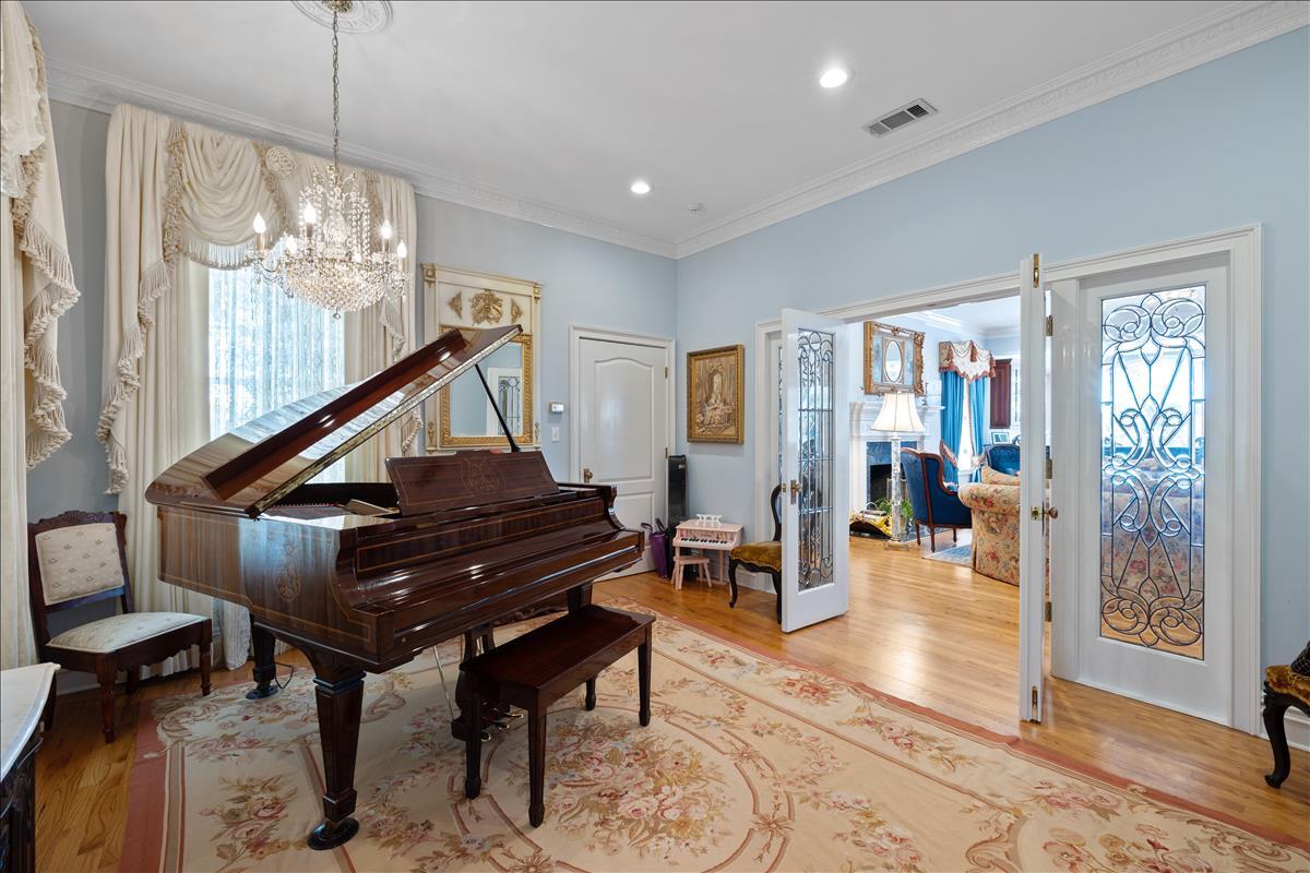 83 Poquito Road Shalimar, FL 32579 - Photo 32 of 83 a living room with furniture and a piano