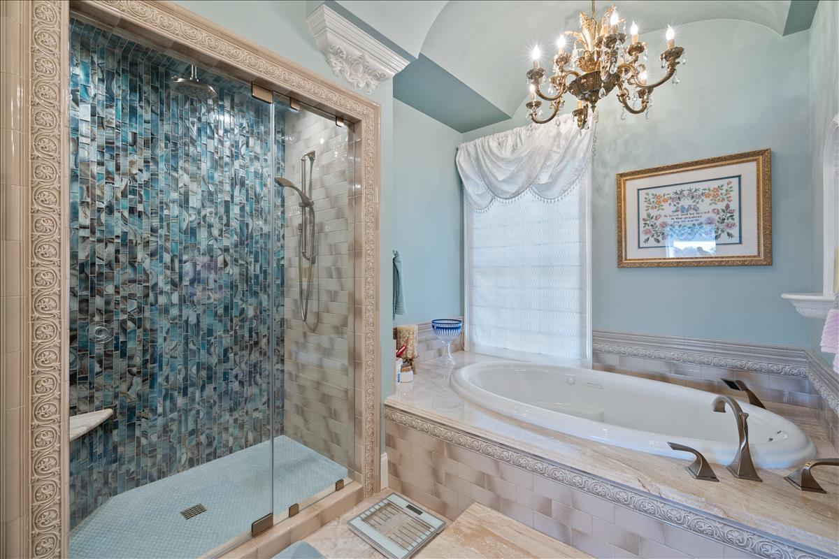 83 Poquito Road Shalimar, FL 32579 - Photo 43 of 83 a bathroom with a bathtub sink and shower