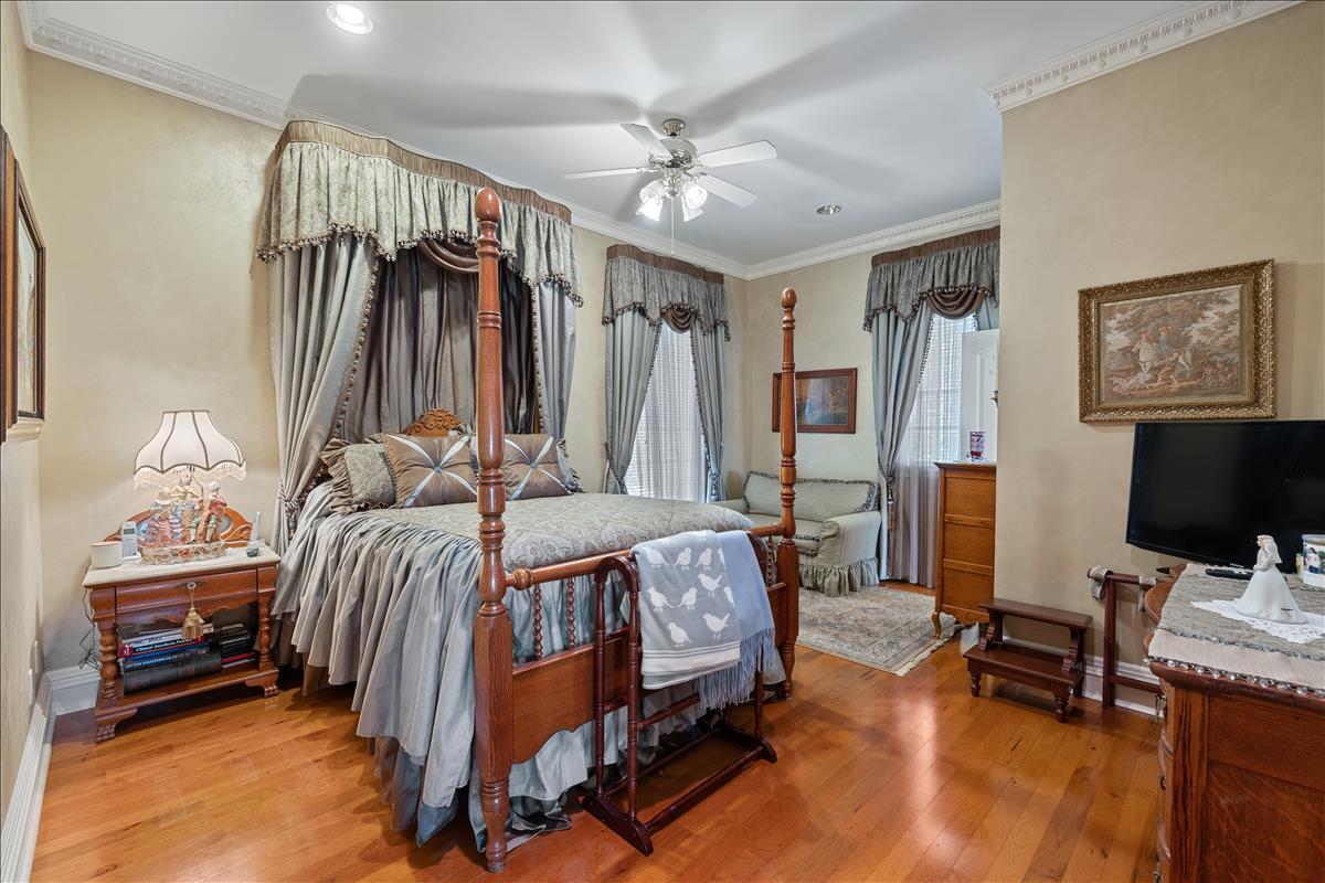 83 Poquito Road Shalimar, FL 32579 - Photo 55 of 83 a bedroom with a bed and a tv