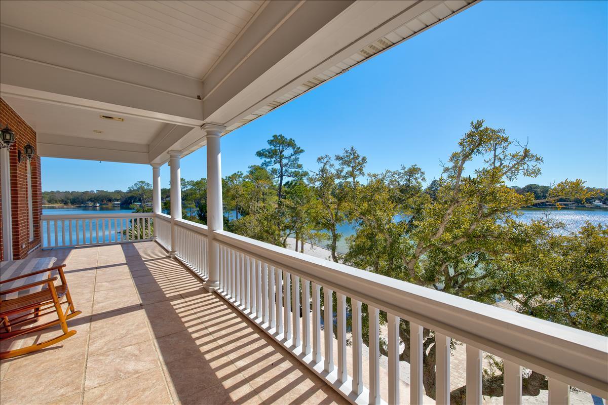 83 Poquito Road Shalimar, FL 32579 - Photo 64 of 83 a view of balcony with furniture