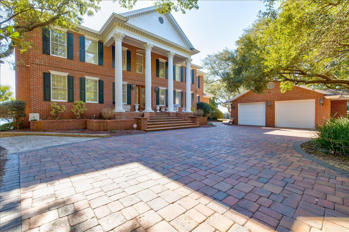 83 Poquito Road Shalimar, FL 32579 - Photo 7 of 83 a front view of a house with a yard