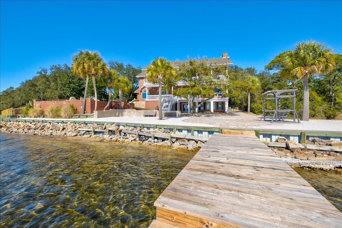 83 Poquito Road Shalimar, FL 32579 - Photo 71 of 83 a view of a swimming pool with an ocean view
