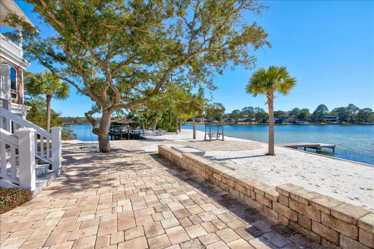 83 Poquito Road Shalimar, FL 32579 - Photo 72 of 83 a view of a yard with trees