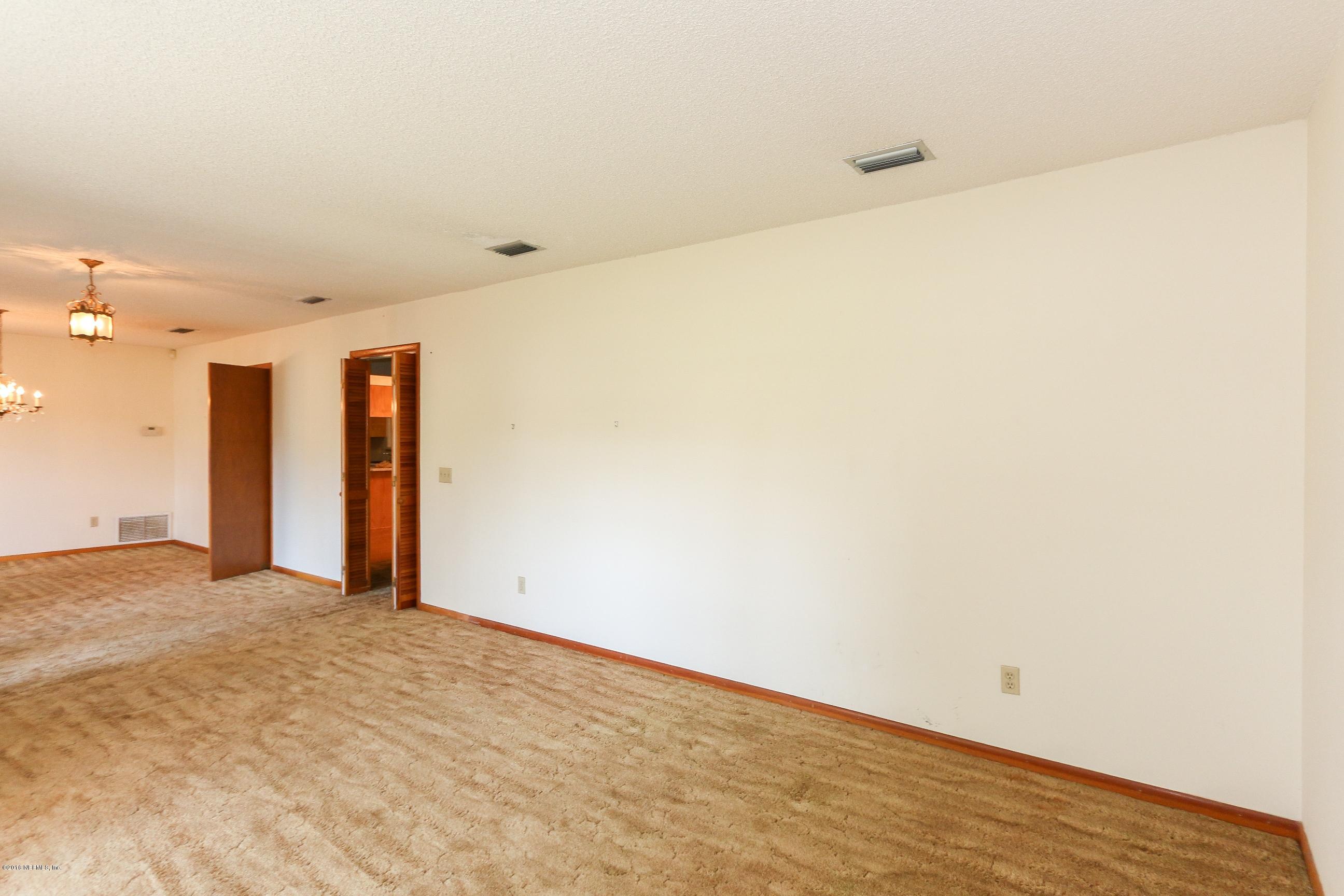 5660 Swamp Fox Road Jacksonville, FL 32210 - Photo 11 of 79 Living Room View 2