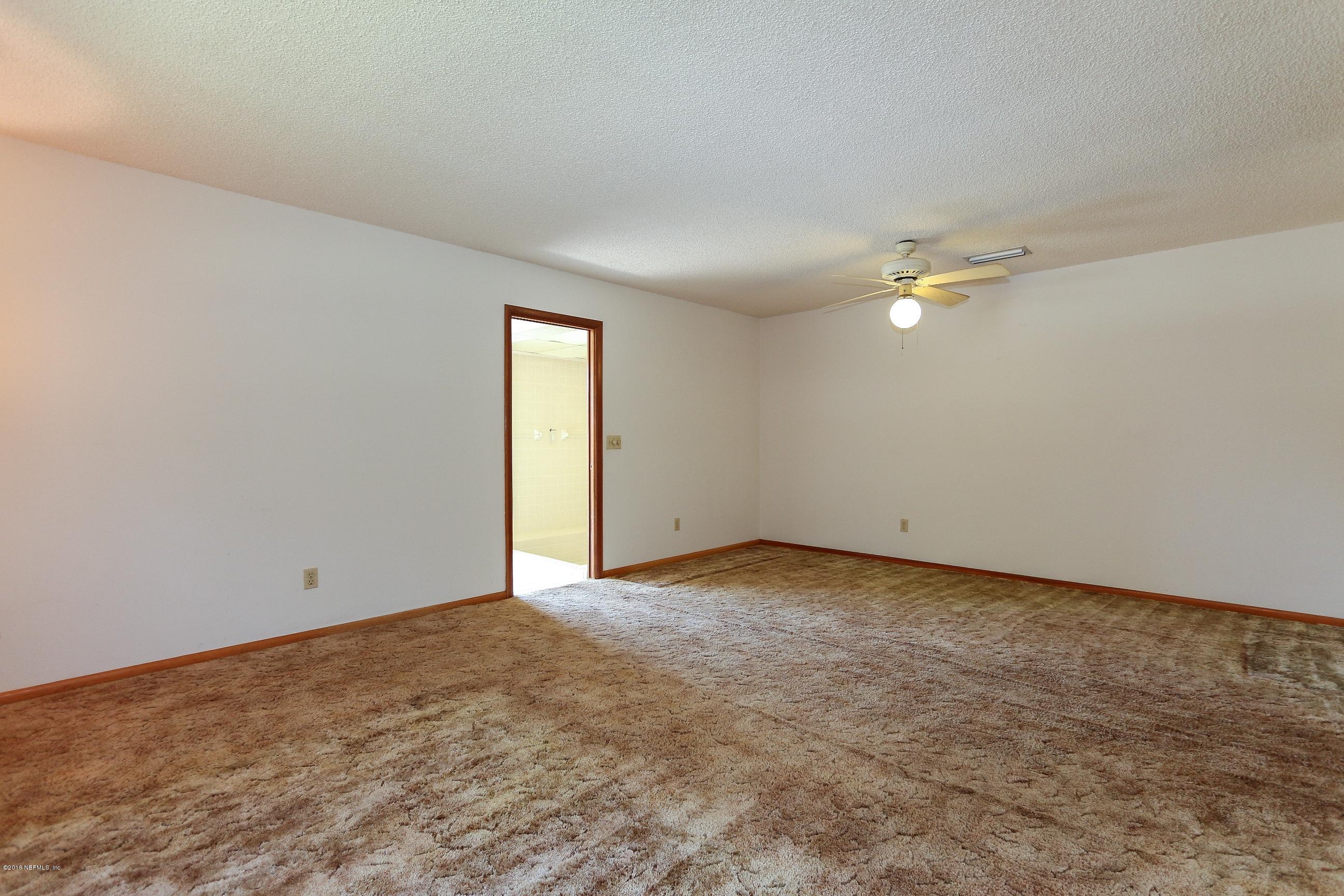 5660 Swamp Fox Road Jacksonville, FL 32210 - Photo 27 of 79 Master Bedroom View 2