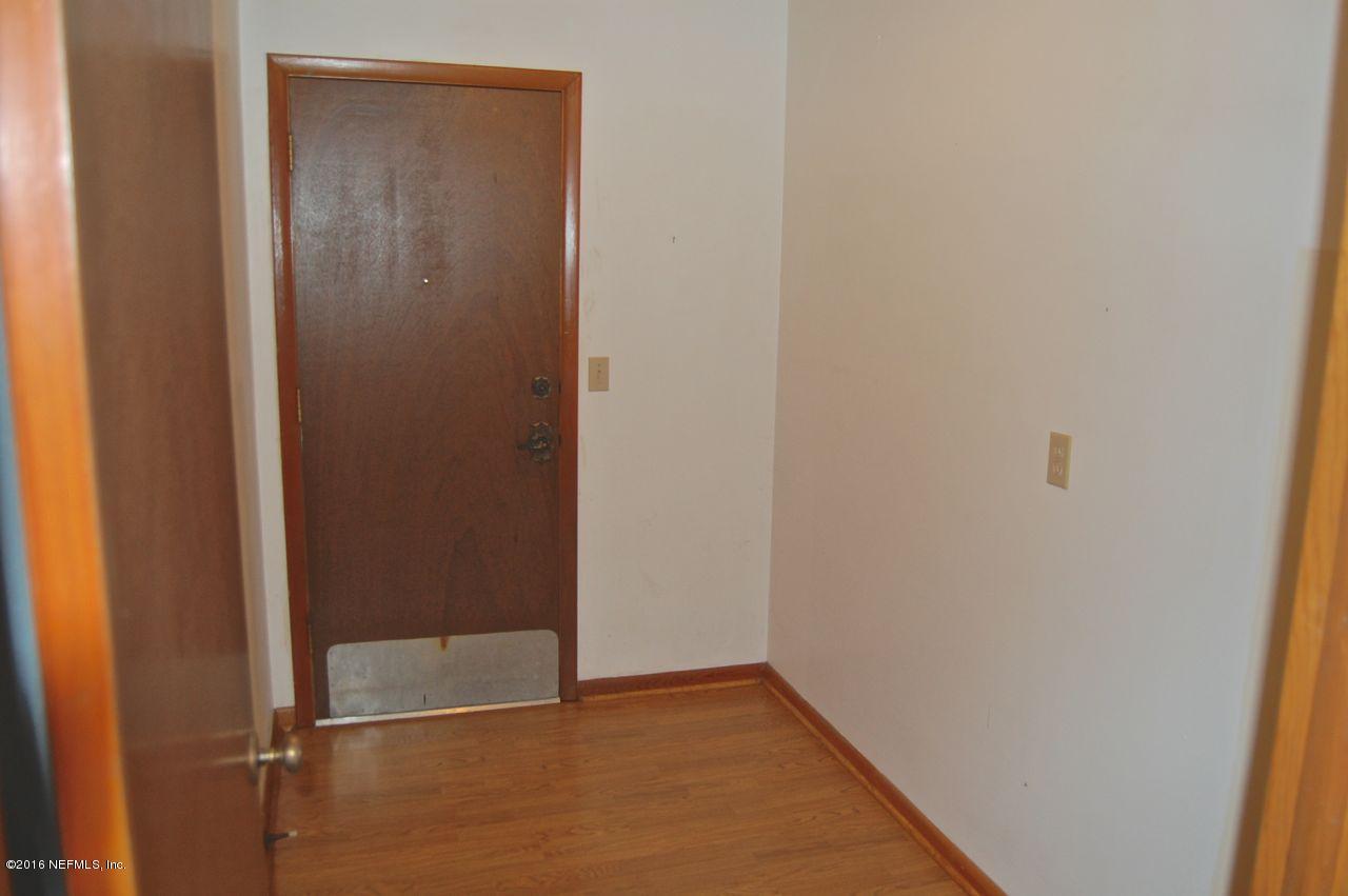 5660 Swamp Fox Road Jacksonville, FL 32210 - Photo 76 of 79 Side exit door