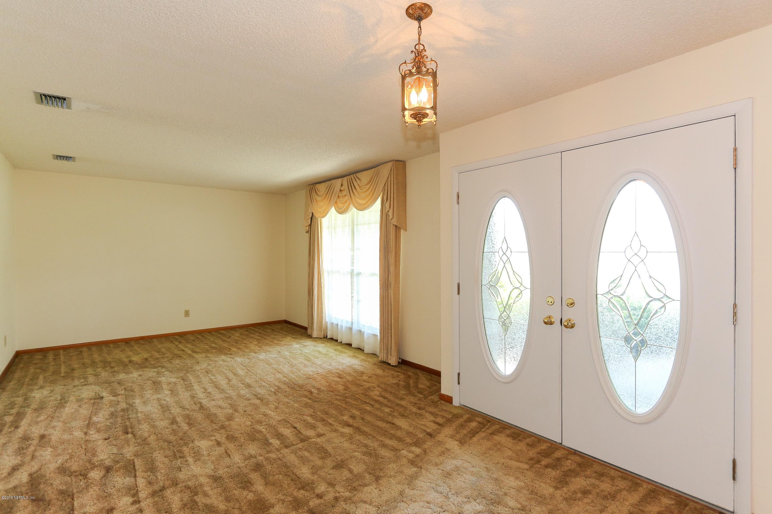 5660 Swamp Fox Road Jacksonville, FL 32210 - Photo 9 of 79 Foyer View 2