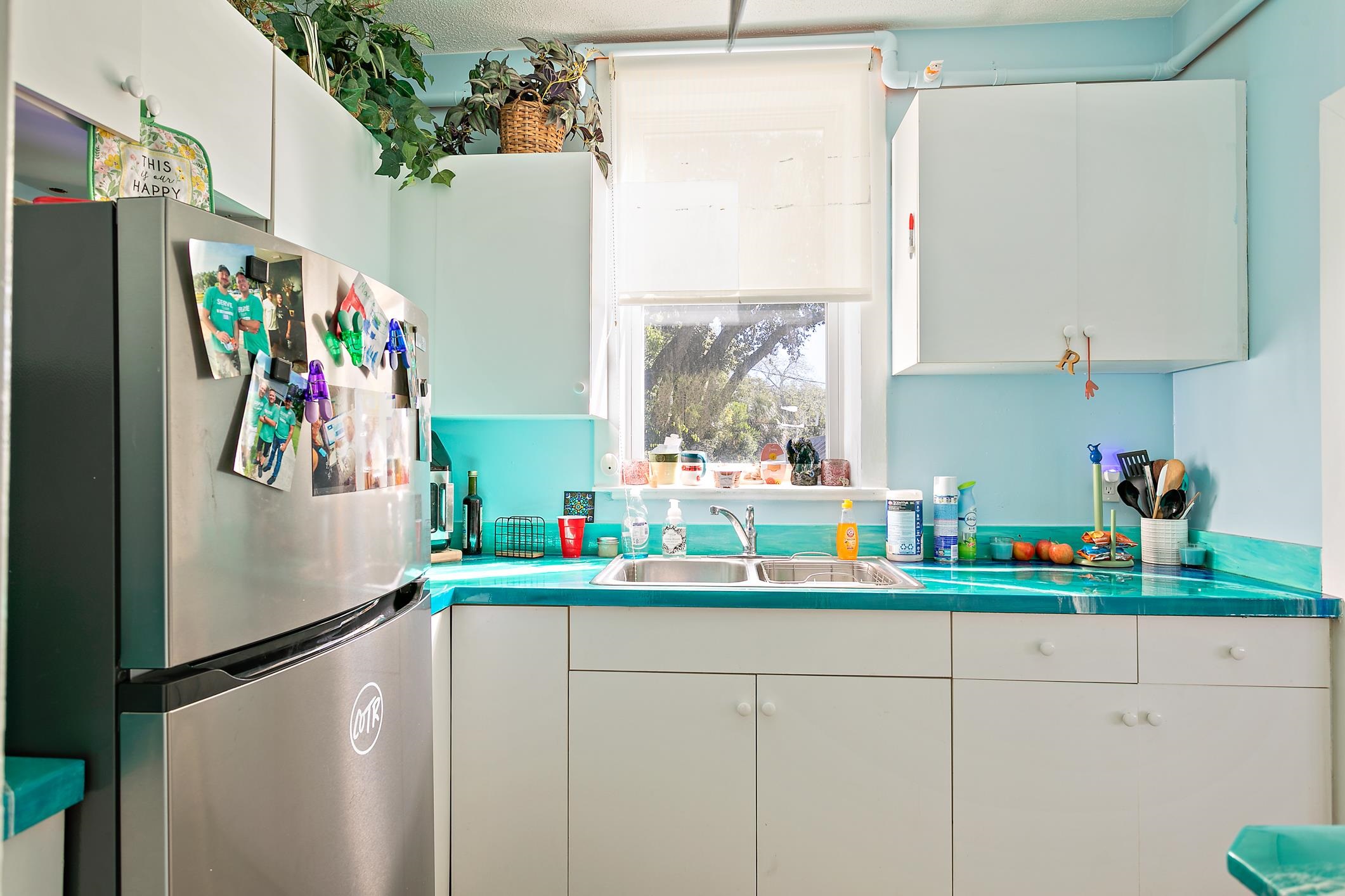 56 Grove Avenue St. Augustine, FL 32084 - Photo 13 of 48 a kitchen with stainless steel appliances a refrigerator and a sink