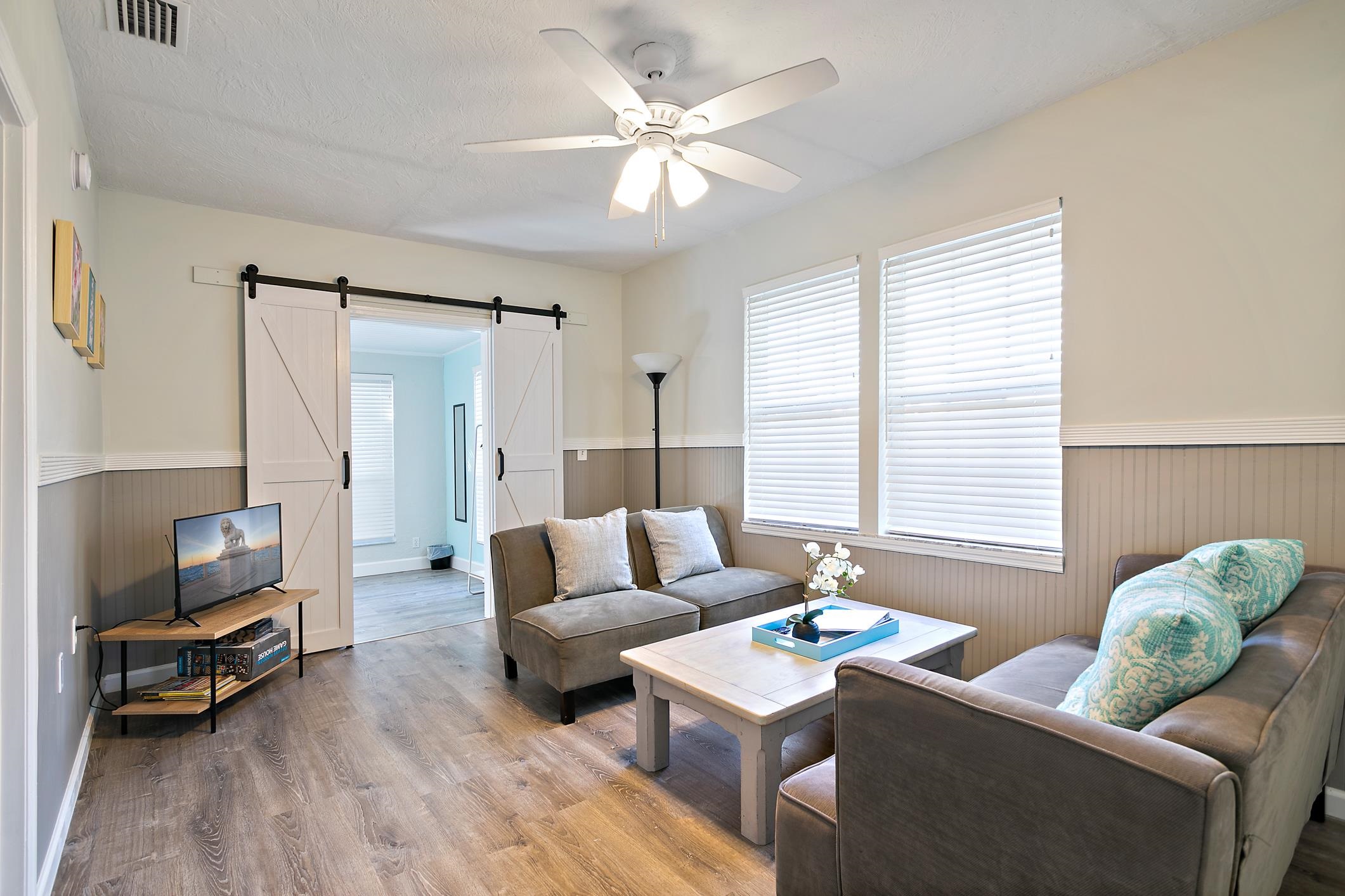 56 Grove Avenue St. Augustine, FL 32084 - Photo 21 of 48 a living room with furniture and a large window