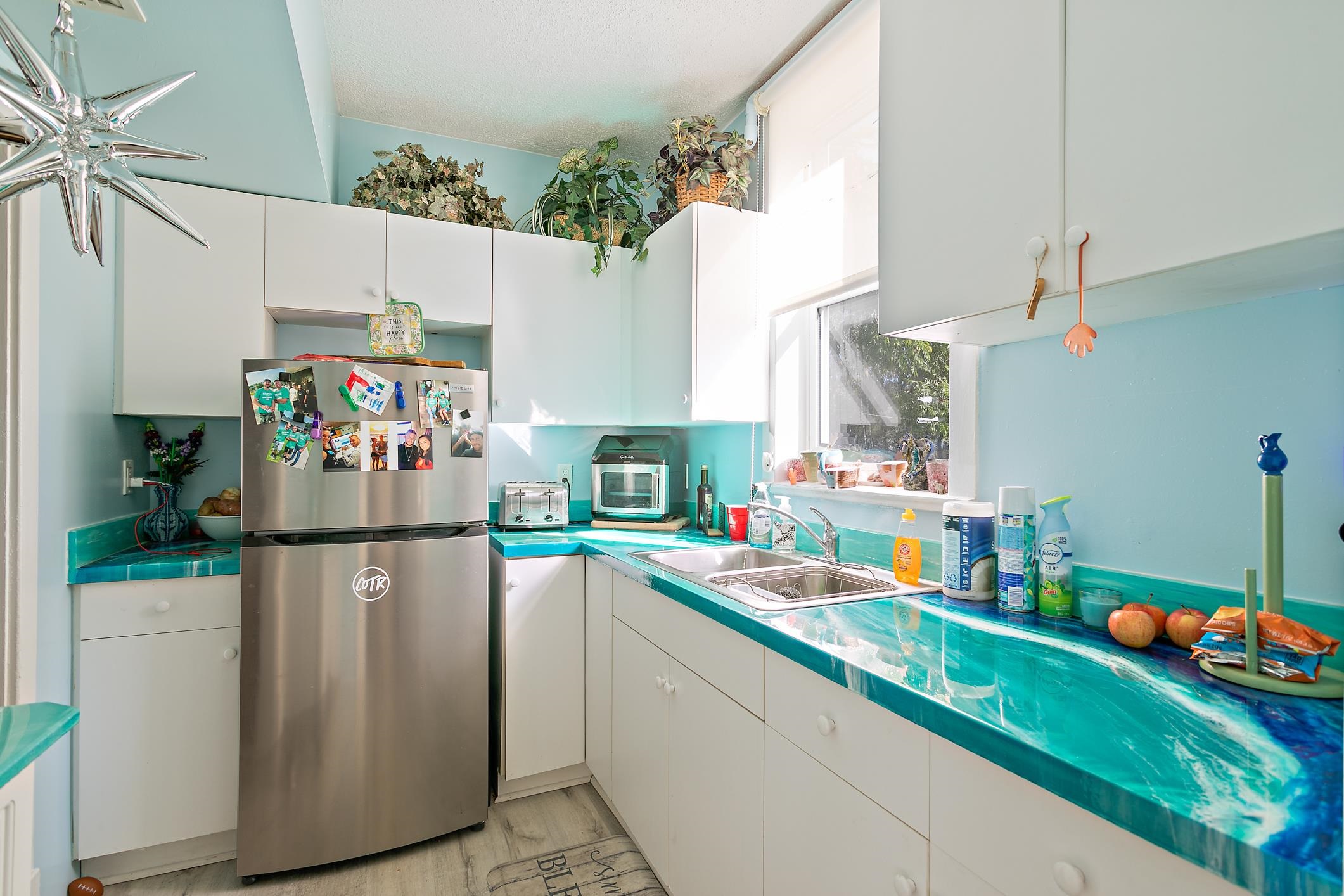 56 Grove Avenue St. Augustine, FL 32084 - Photo 6 of 48 a kitchen with stainless steel appliances granite countertop a refrigerator and a sink