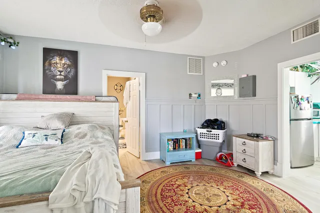 a bedroom with a bed and closet