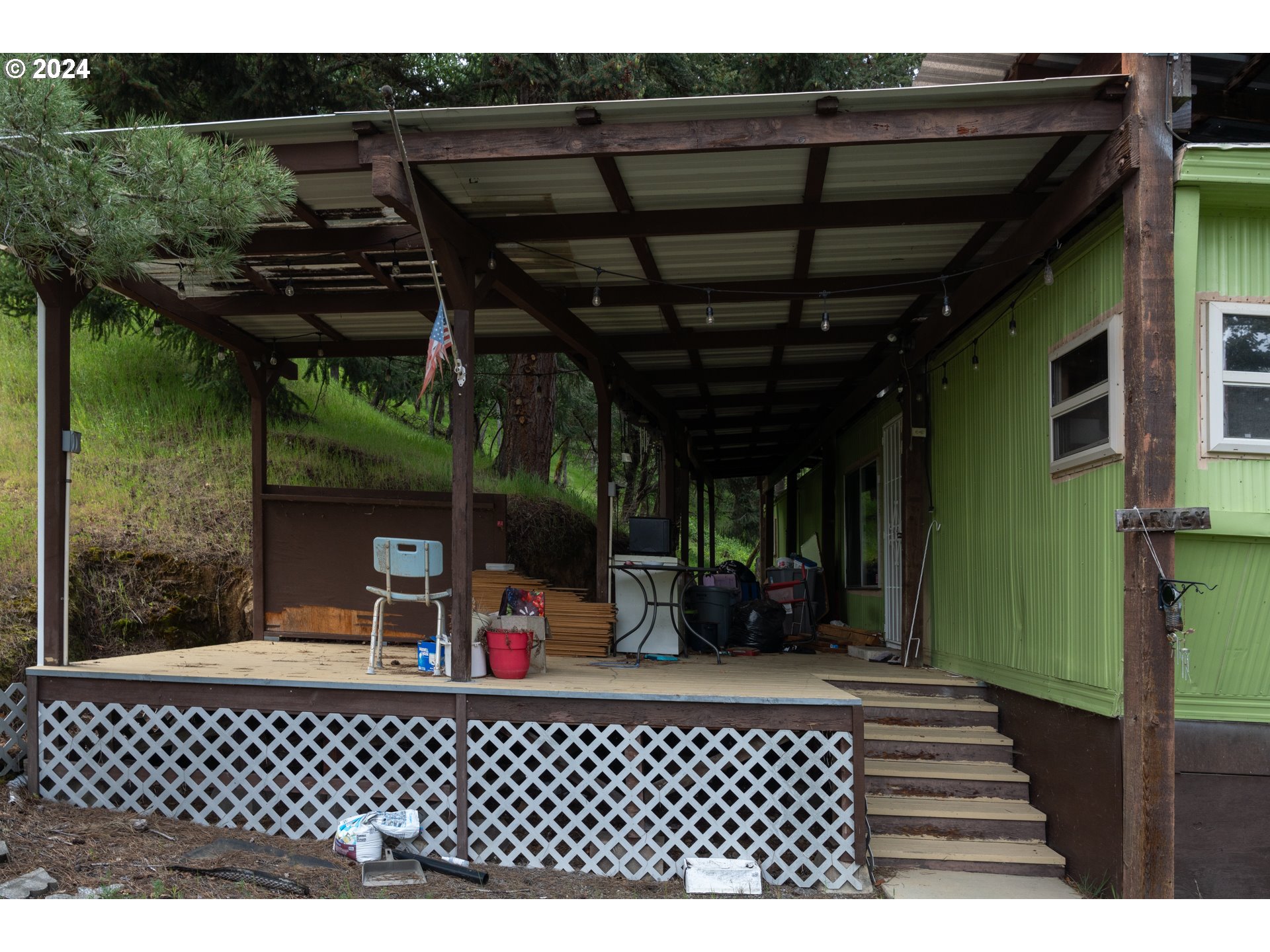 1120 Clarks Branch Road Myrtle Creek, OR 97457 - Photo 23 of 37 a view of a chairs and table in patio