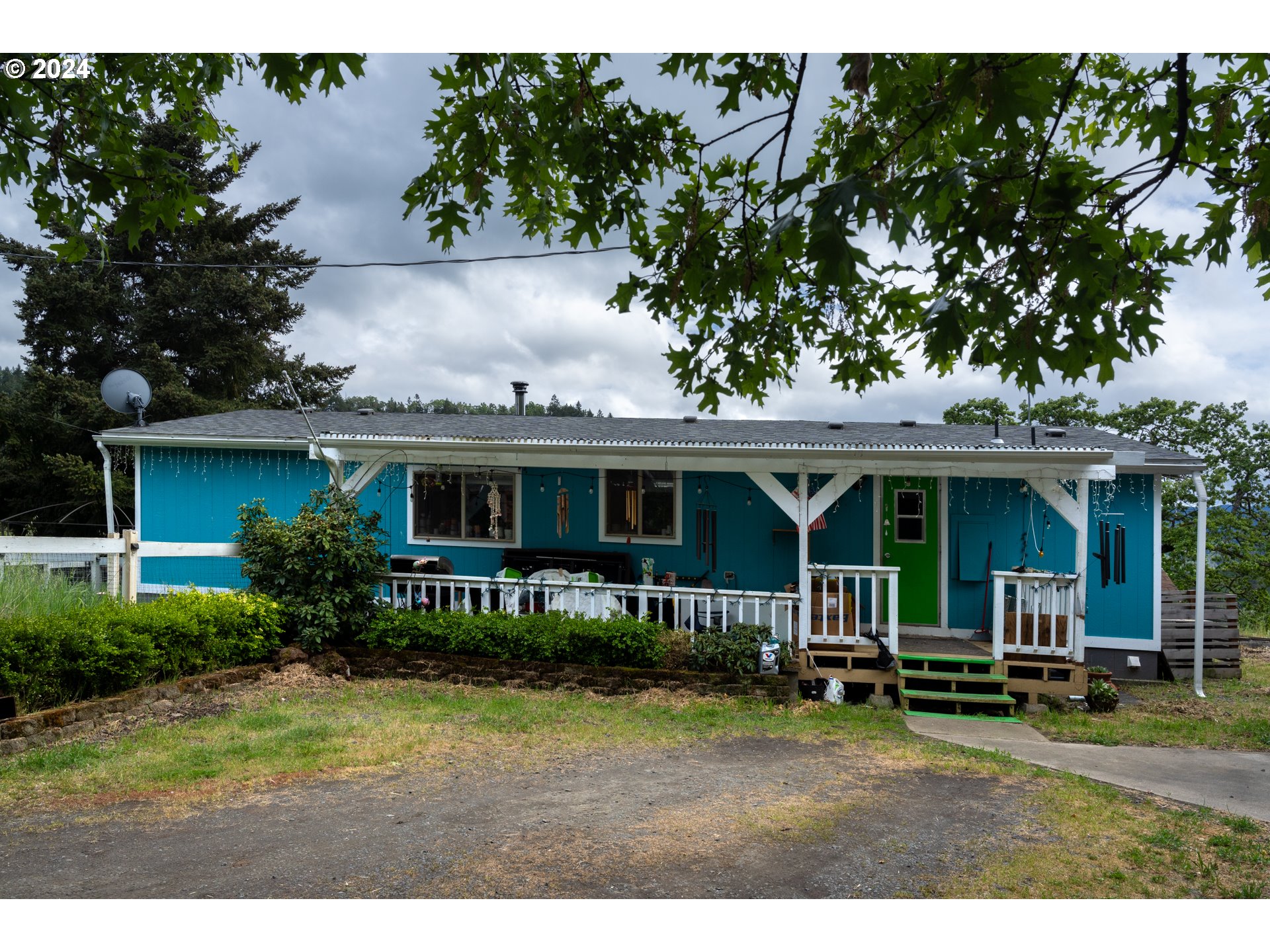 1120 Clarks Branch Road Myrtle Creek, OR 97457 - Photo 10 of 37 a view of house with outdoor entertaining spaces
