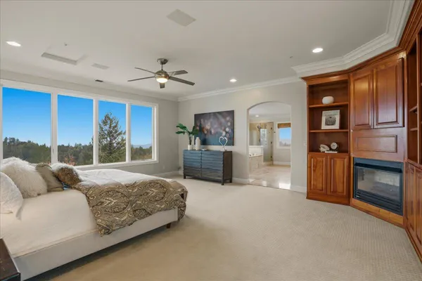 a bed room with furniture and window