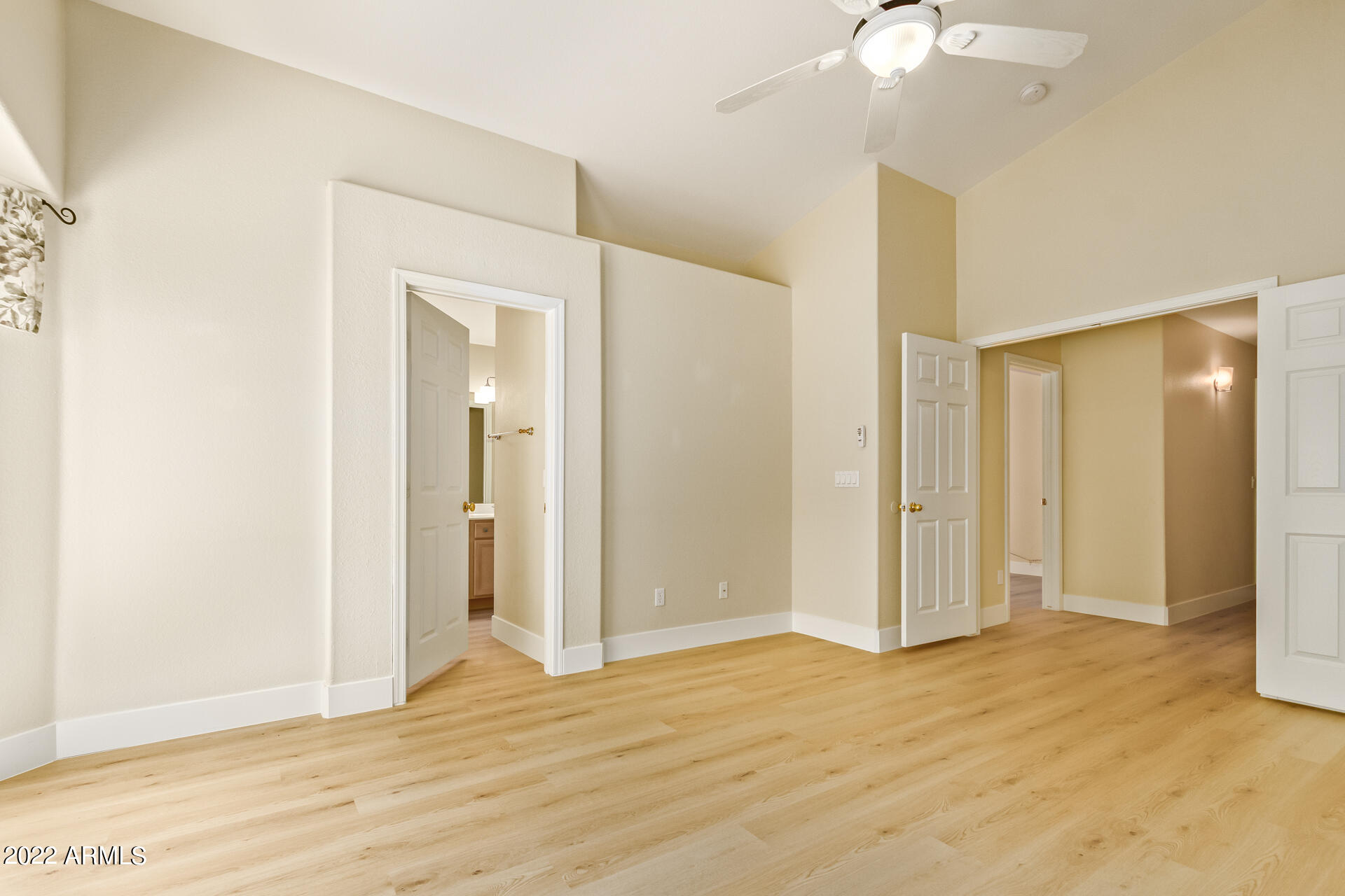 1647 East Heather Avenue Gilbert, AZ 85234 - Photo 15 of 27 a view of an empty room with wooden floor