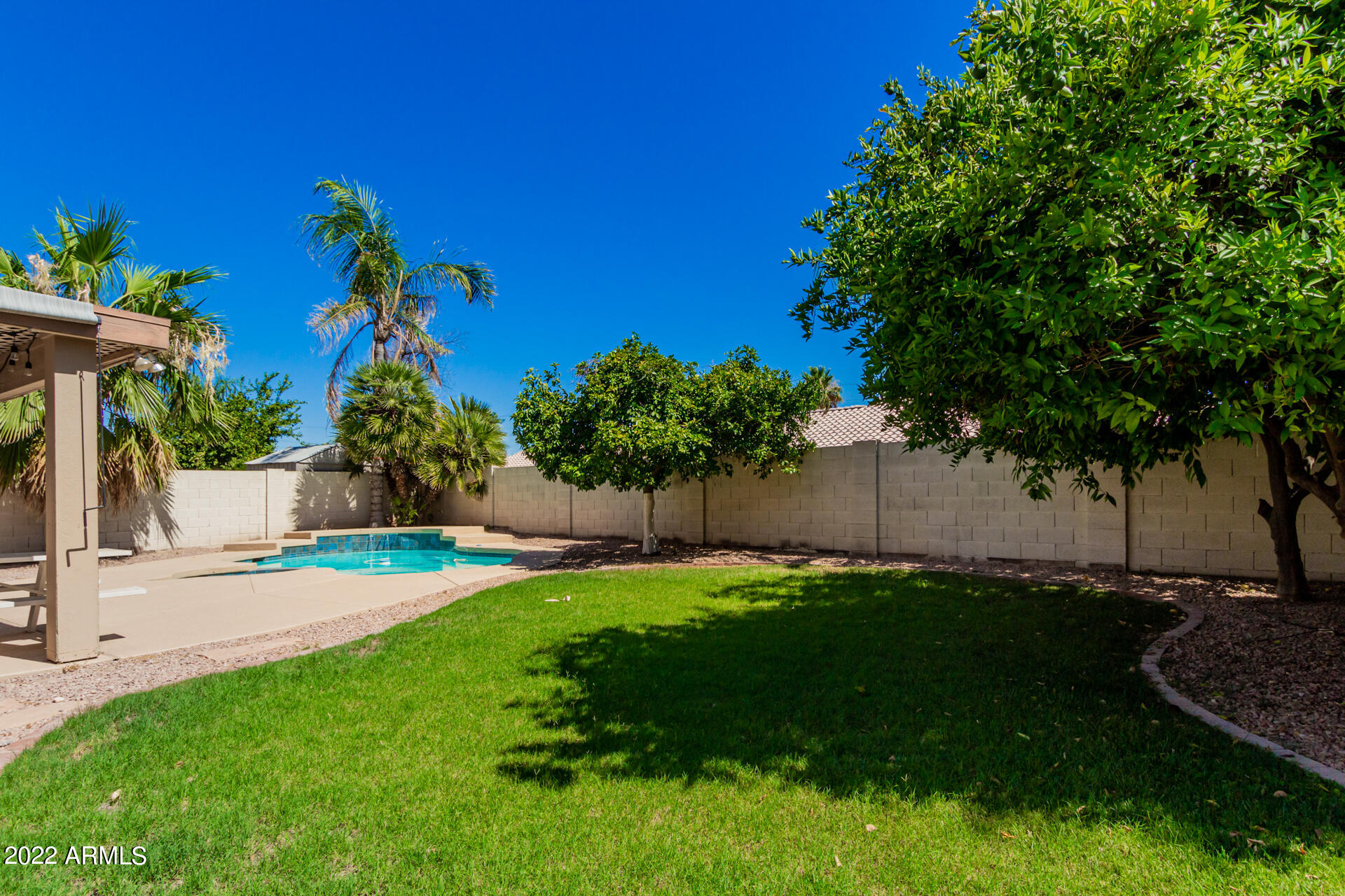 1647 East Heather Avenue Gilbert, AZ 85234 - Photo 27 of 27 a view of a backyard with a garden