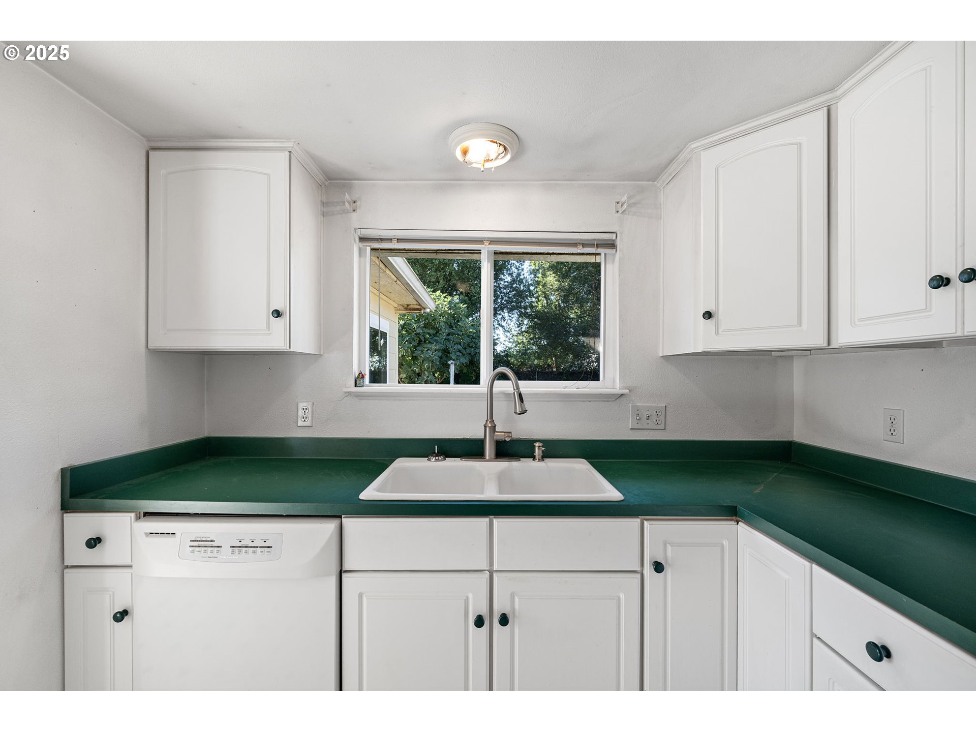 1917 Scott Road Springfield, OR 97477 - Photo 15 of 31 a kitchen with a sink and cabinets