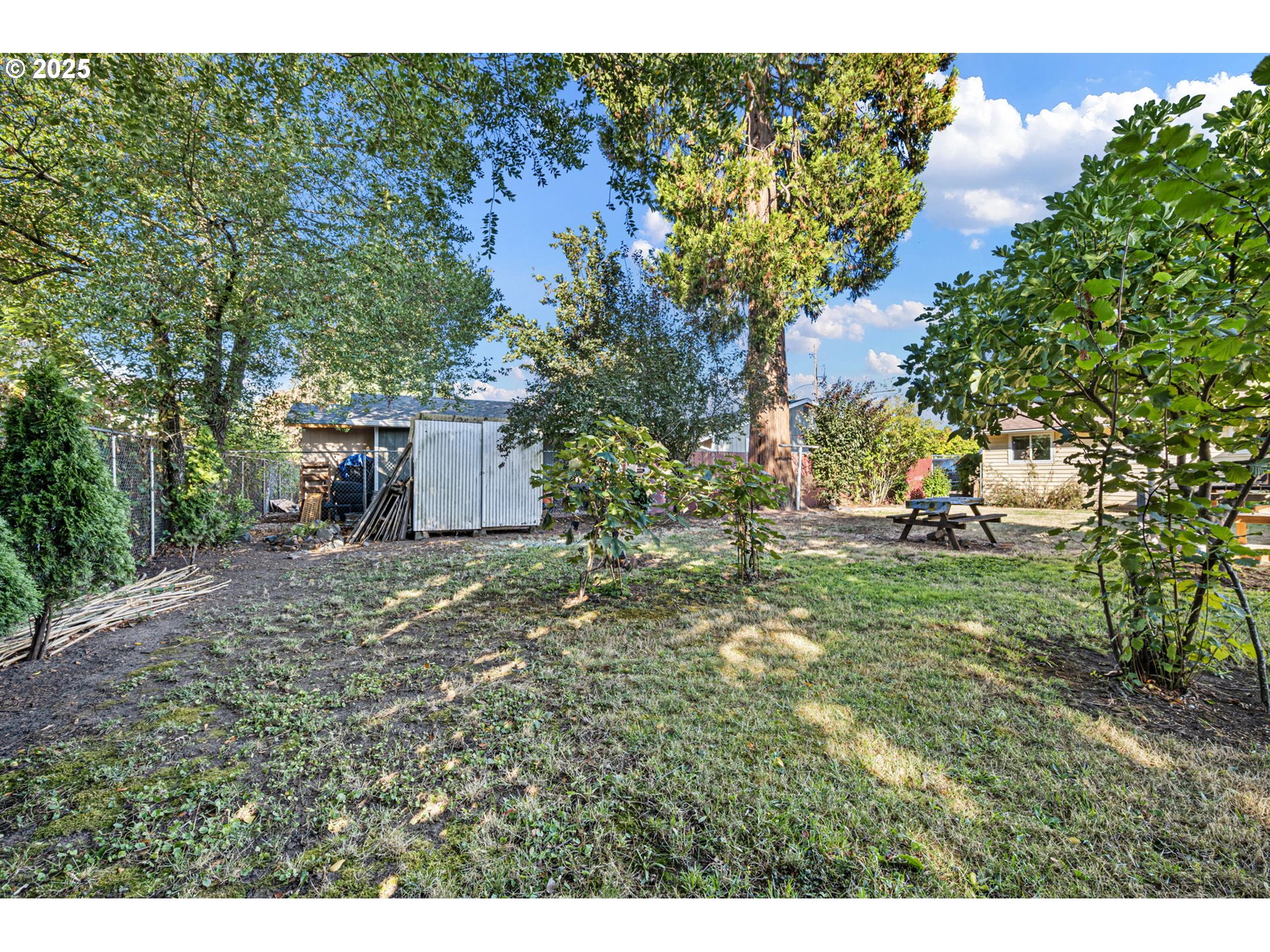 1917 Scott Road Springfield, OR 97477 - Photo 29 of 31 a backyard of a house with a yard and outdoor seating