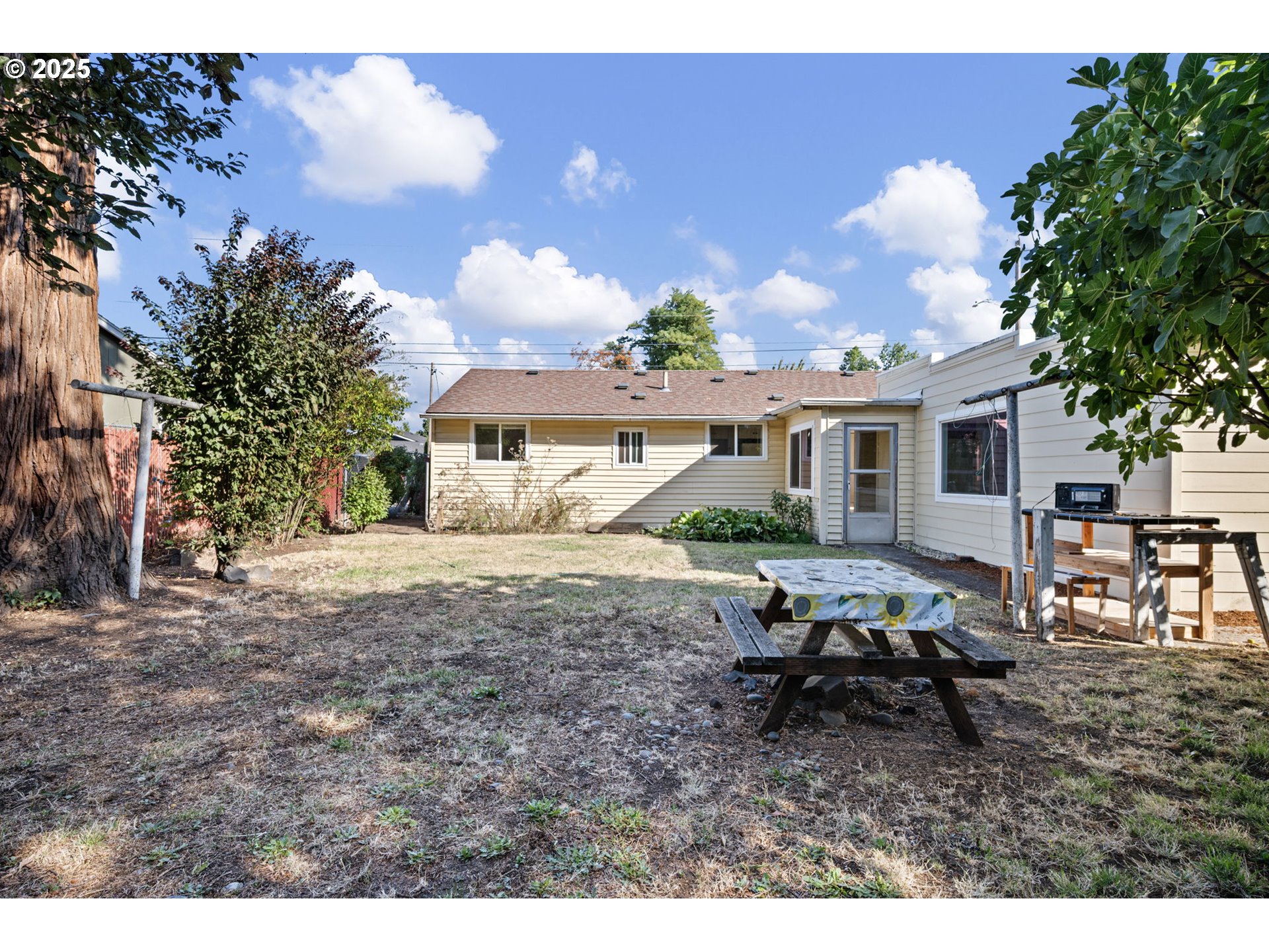 1917 Scott Road Springfield, OR 97477 - Photo 31 of 31 a view of a house with backyard porch and sitting area