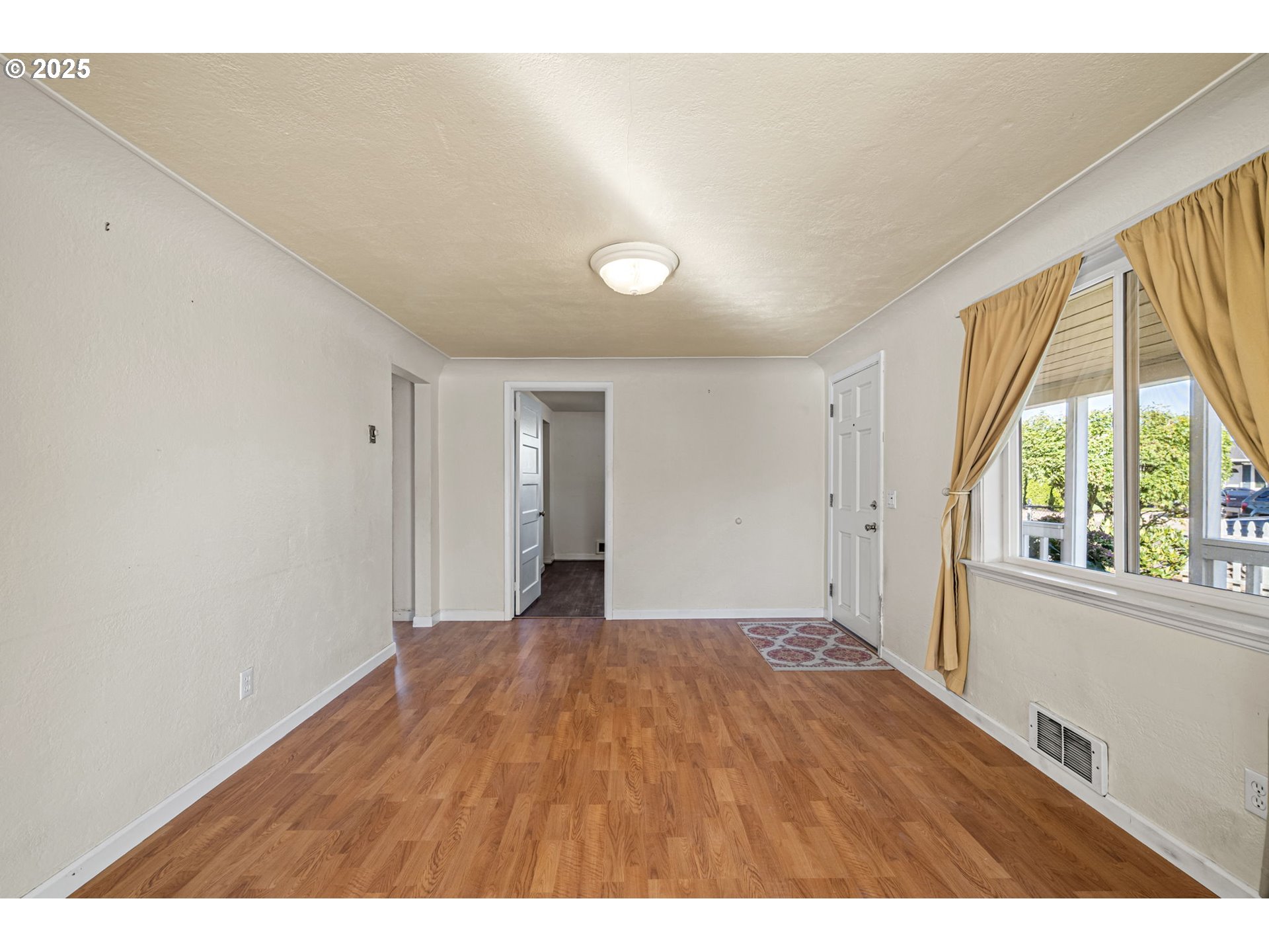 1917 Scott Road Springfield, OR 97477 - Photo 5 of 31 a view of an empty room with a window