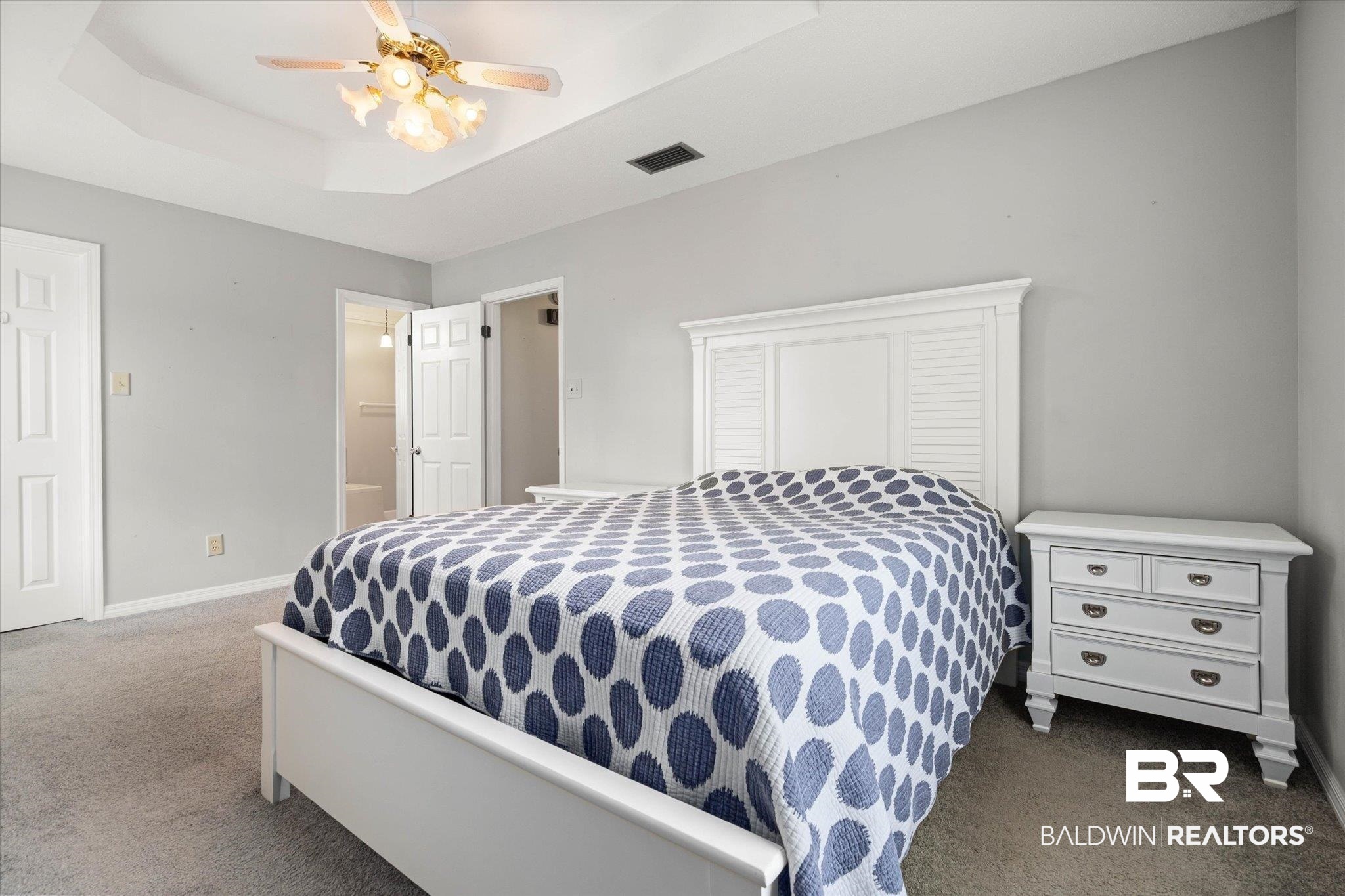 6632 Autumn Ridge Drive Mobile, AL 36695 - Photo 11 of 22 Bedroom featuring dark colored carpet, a tray ceiling, and ceiling fan