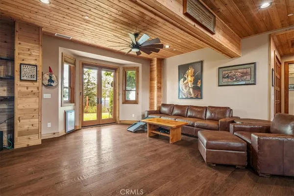 a kitchen with stainless steel appliances granite countertop a refrigerator a sink dishwasher stove and refrigerator