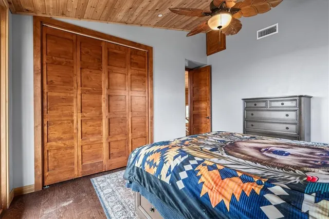 a balcony with trees in front of it