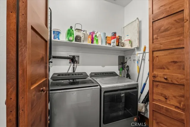 a bedroom with a bed and a cabinets