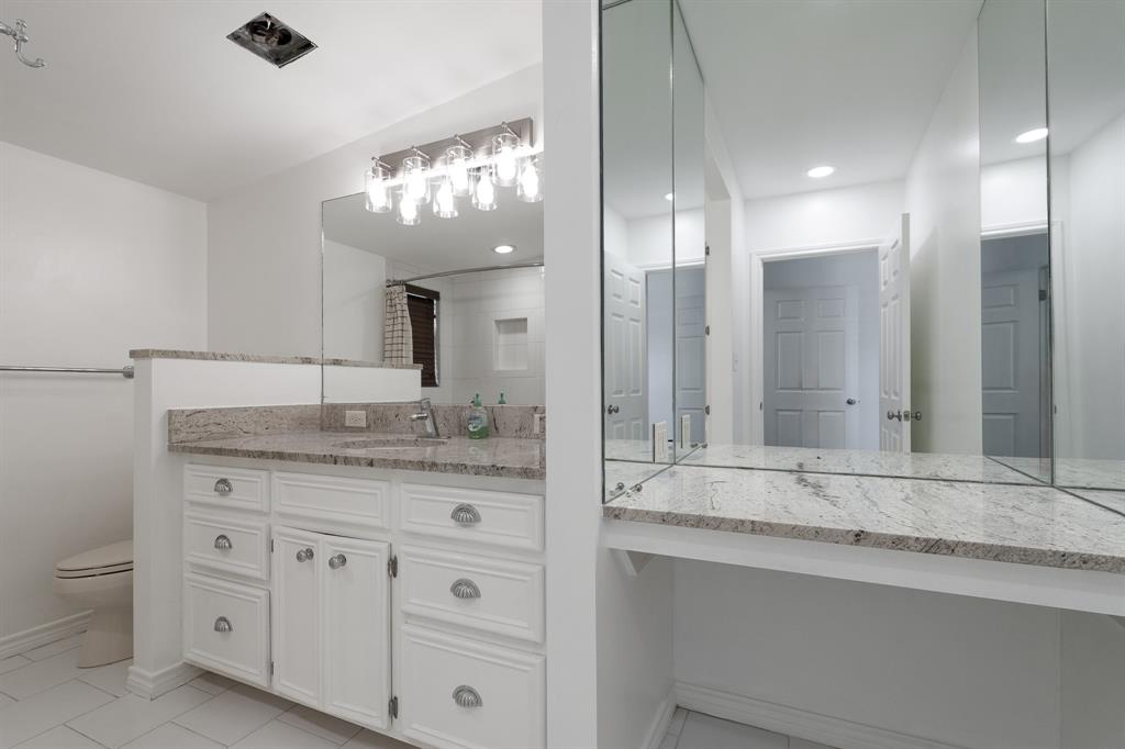 809 Turner Lane Tuscola, TX 79562 - Photo 6 of 25 Full bath with vanity, tile patterned flooring, and a shower