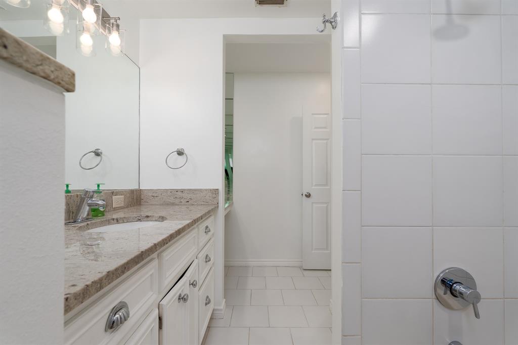 809 Turner Lane Tuscola, TX 79562 - Photo 7 of 25 Full bathroom with vanity, tile patterned floors, and bathtub / shower combination