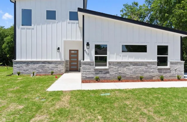a view of house with backyard porch and outdoor space