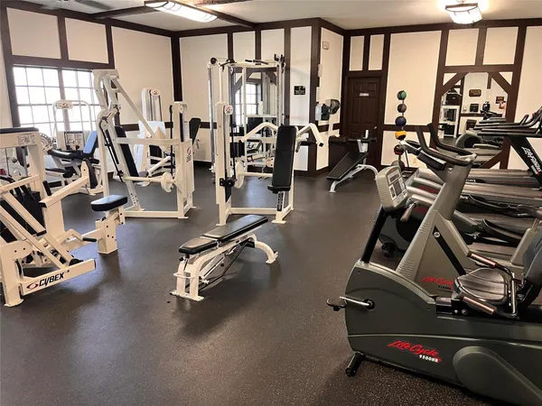 a view of a room with gym equipment