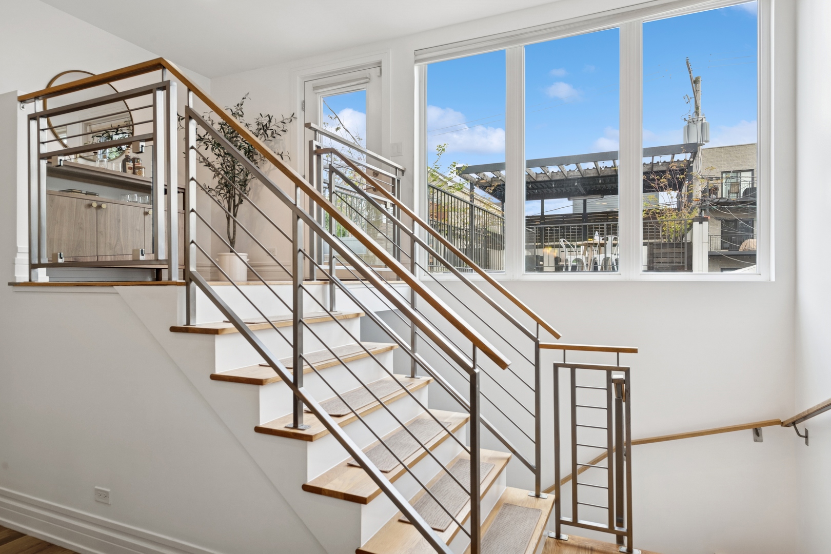 2113 West Huron Street Chicago, IL 60612 - Photo 17 of 49 a view of entryway and hall with wooden floor