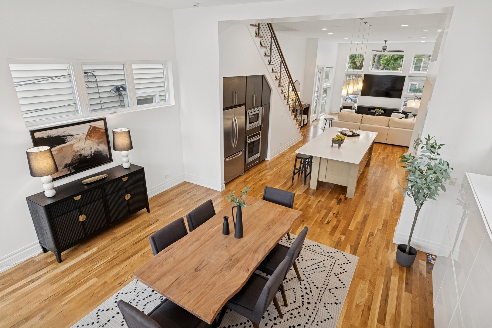 2113 West Huron Street Chicago, IL 60612 - Photo 23 of 49 a living room with furniture and a flat screen tv