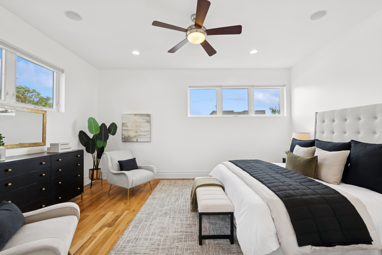 2113 West Huron Street Chicago, IL 60612 - Photo 25 of 49 a bedroom with a bed dresser and window