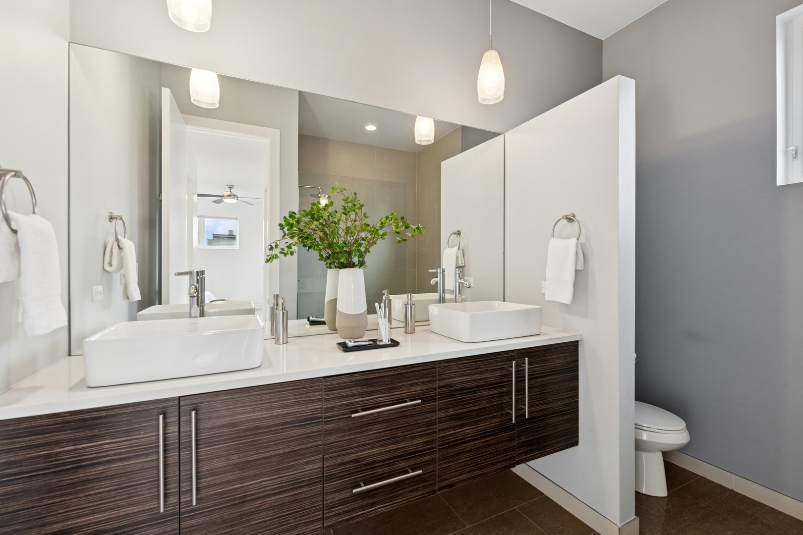 2113 West Huron Street Chicago, IL 60612 - Photo 29 of 49 a bathroom with a sink double vanity and a mirror
