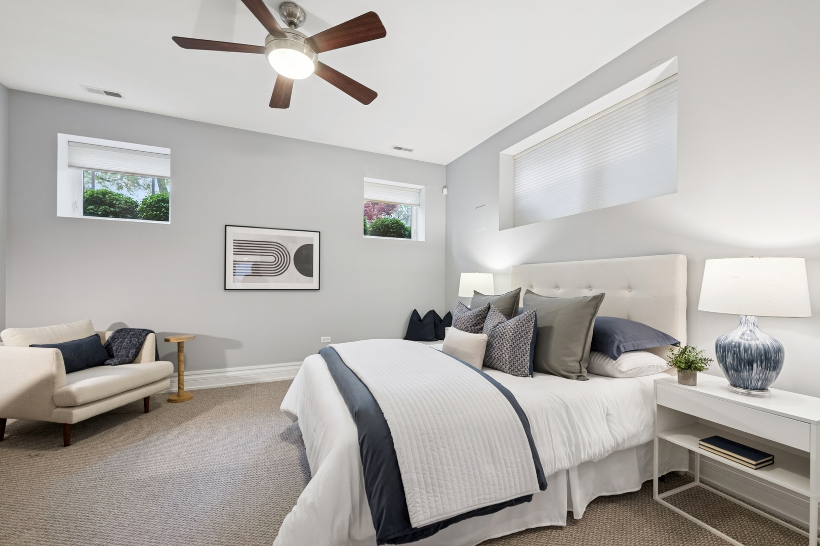 2113 West Huron Street Chicago, IL 60612 - Photo 37 of 49 a bedroom with bed and a chandelier