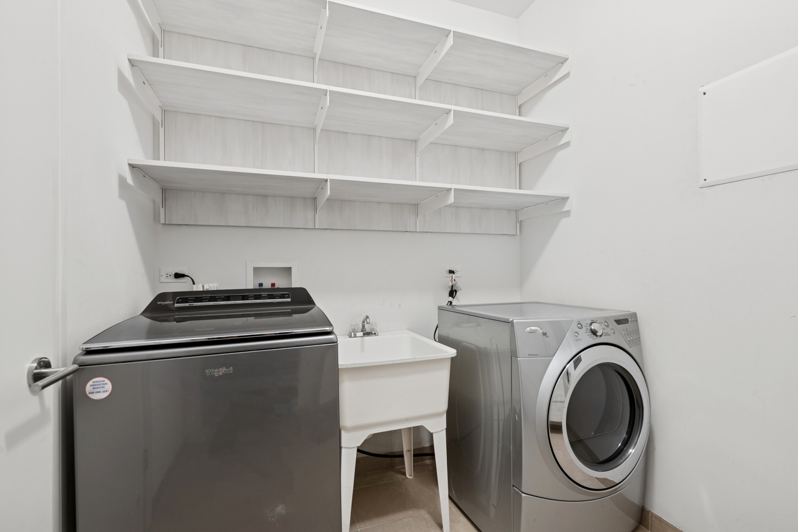 2113 West Huron Street Chicago, IL 60612 - Photo 40 of 49 a utility room with dryer and washer