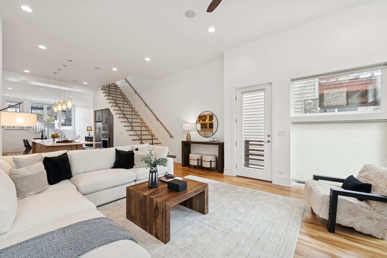 2113 West Huron Street Chicago, IL 60612 - Photo 8 of 49 a living room with furniture and a fireplace