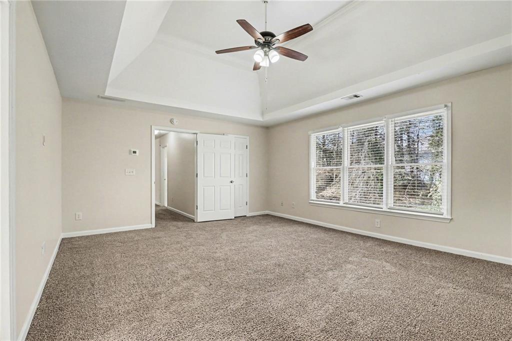 7170 Threadstone Overlook Duluth, GA 30097 - Photo 19 of 26 a view of an empty room with a window