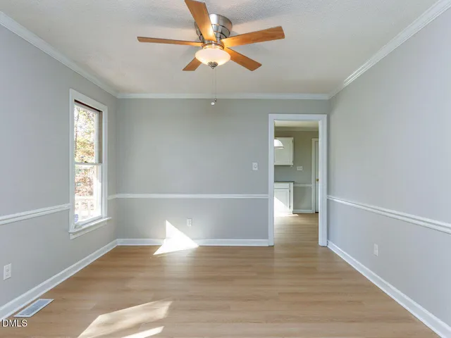 a view of a balcony with wooden floor