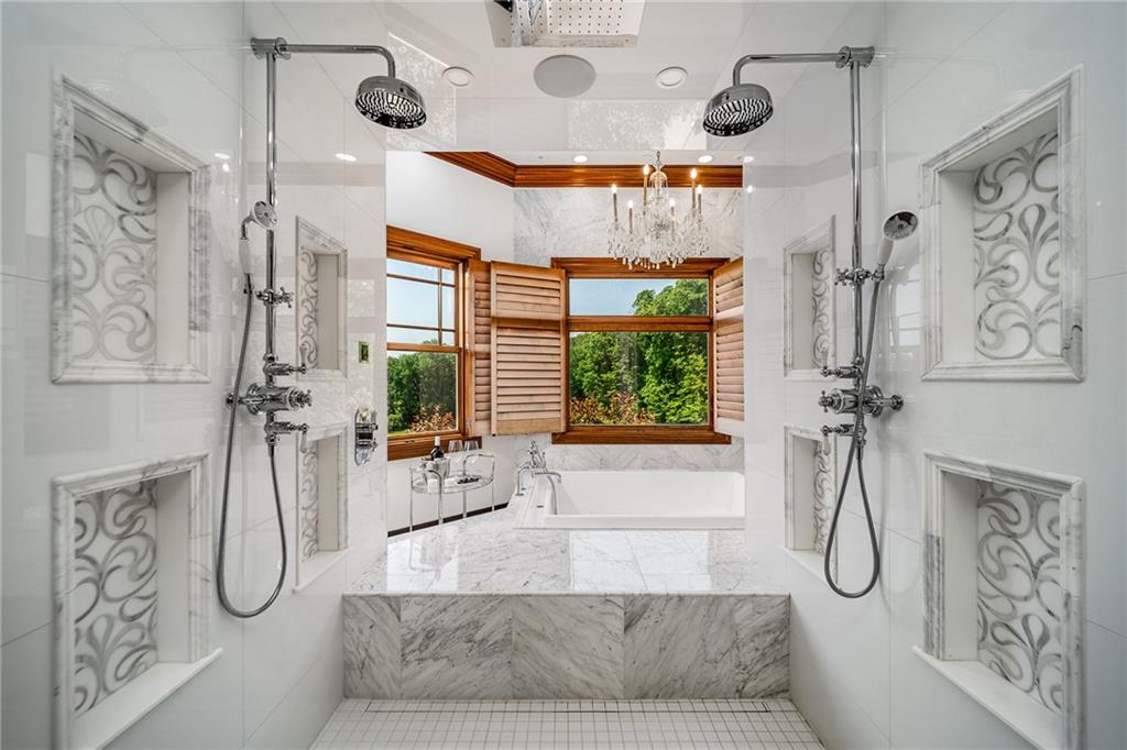 641 Hidden Meadows Lane Ligonier, PA 15658 - Photo 16 of 24 a bathroom with a granite countertop shower and a mirror