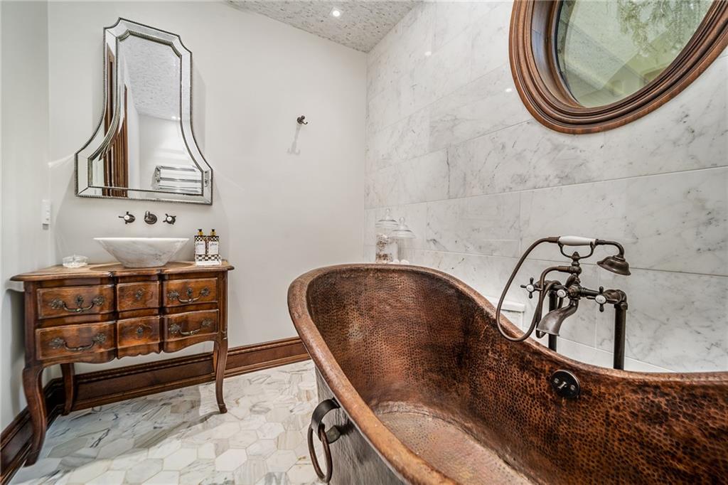 641 Hidden Meadows Lane Ligonier, PA 15658 - Photo 6 of 24 a bathroom with a sink and a mirror