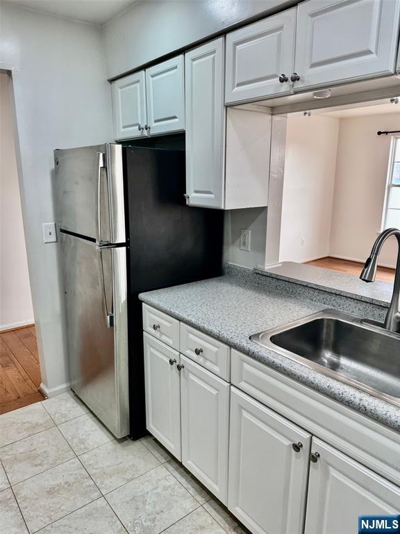 34 Bergen Ridge Road, Unit 2 North Bergen, NJ 07047 - Photo 14 of 41 a kitchen with a refrigerator and a sink